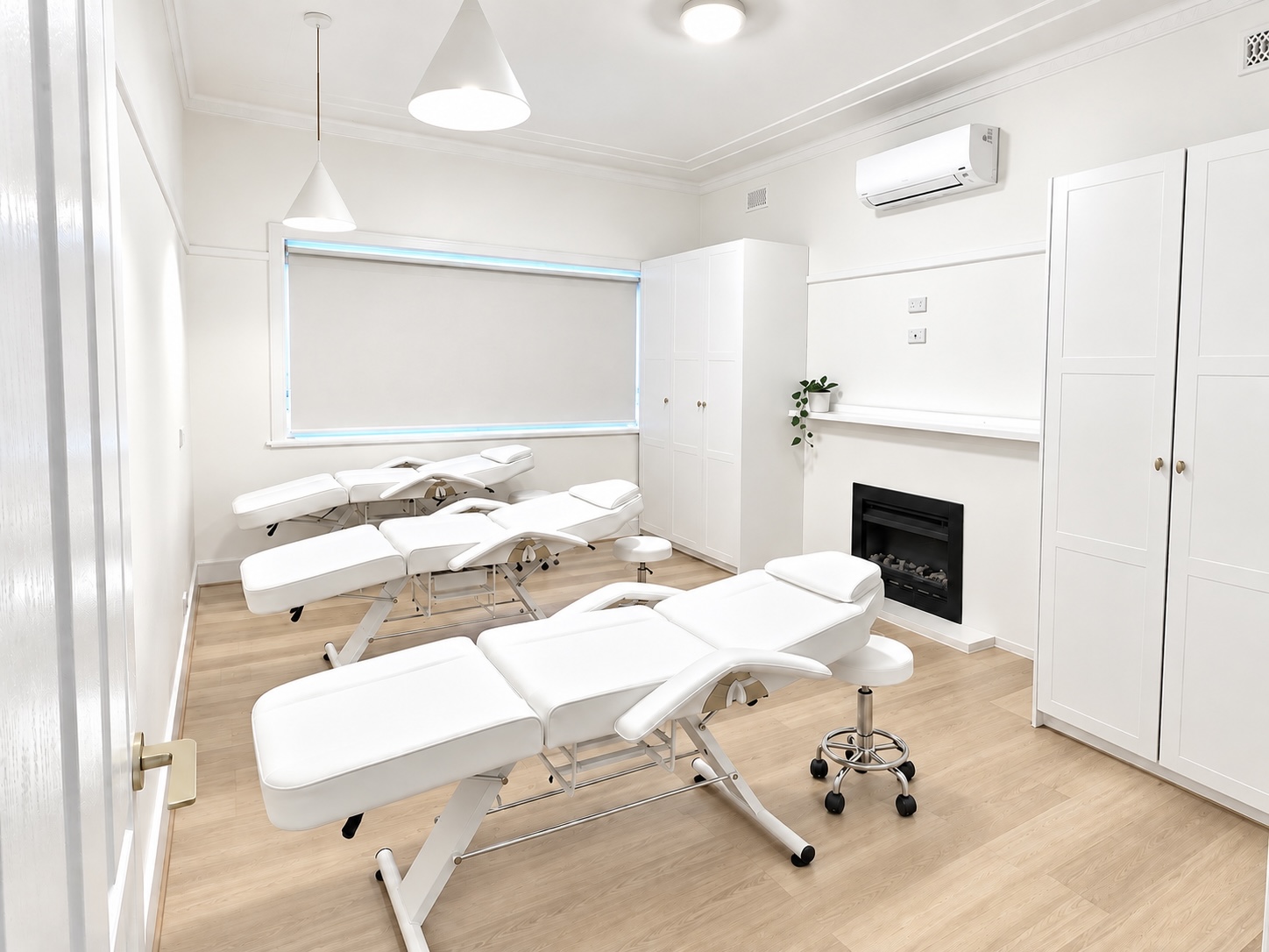 Hair and scalp treatment room with three treatment beds
